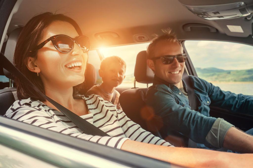 Family driving a car